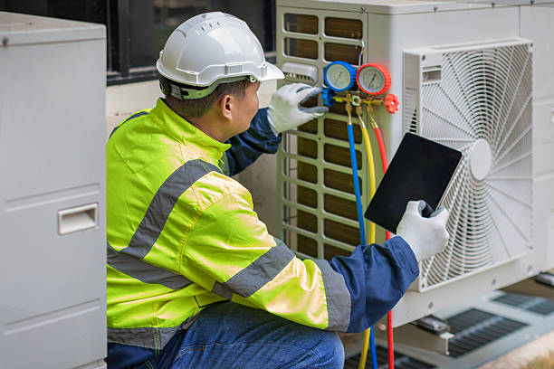 Professional Hvac technician working in Harrodsburg, IN